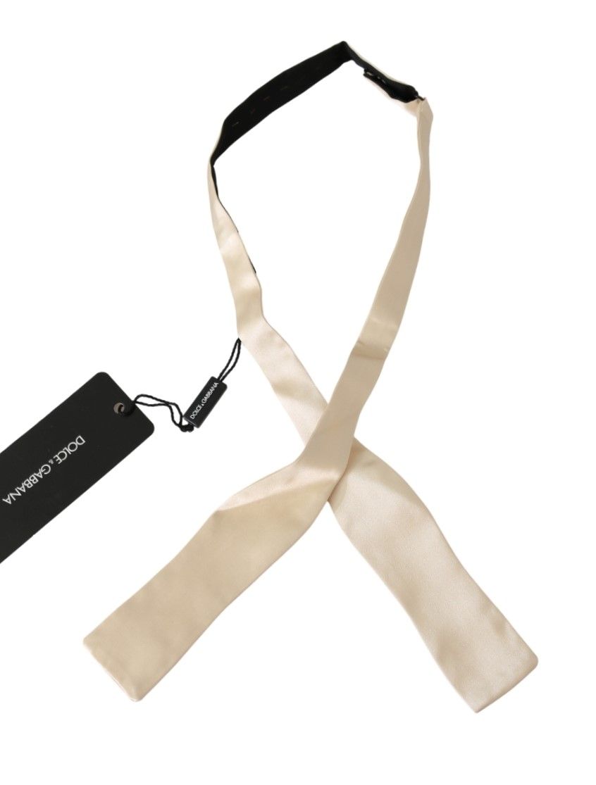 Dolce & Gabbana Elegant Beige Silk Bowtie - Luksuslaukut ja asusteet Dolce & Gabbana - Tutustu YVES JAVANNI® 