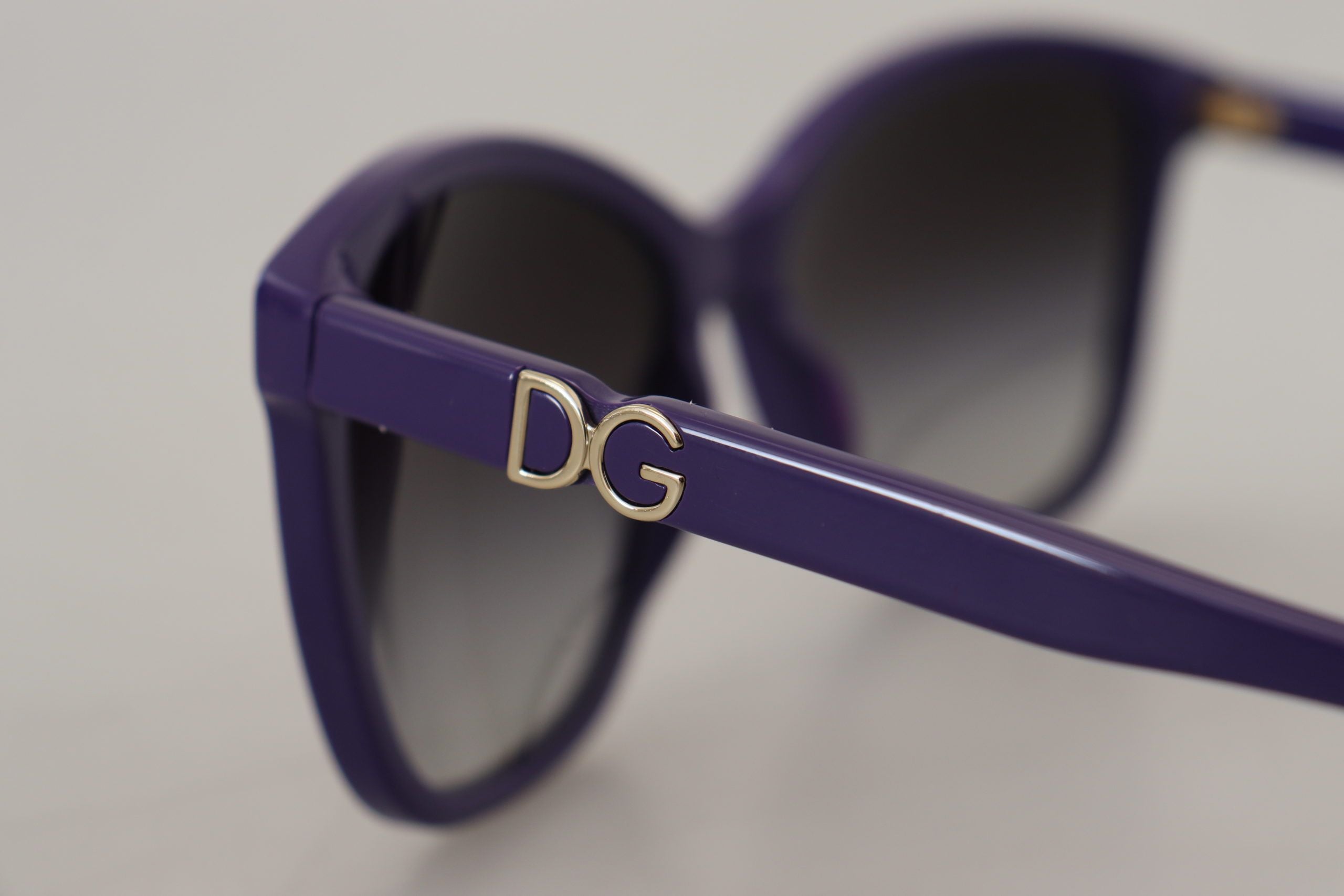 Dolce & Gabbana Elegant Violet Round Sunglasses for Women - Luksusmuotia Dolce & Gabbana - Tutustu YVES JAVANNI® 