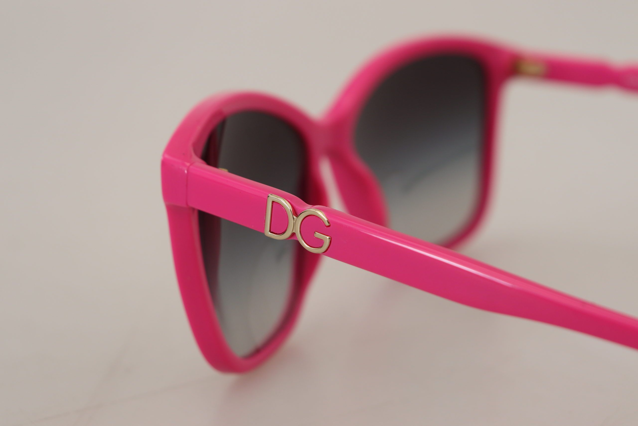 Dolce & Gabbana Elegant Pink Round Sunglasses for Women - Luksuslaukut ja asusteet Dolce & Gabbana - Tutustu YVES JAVANNI® 