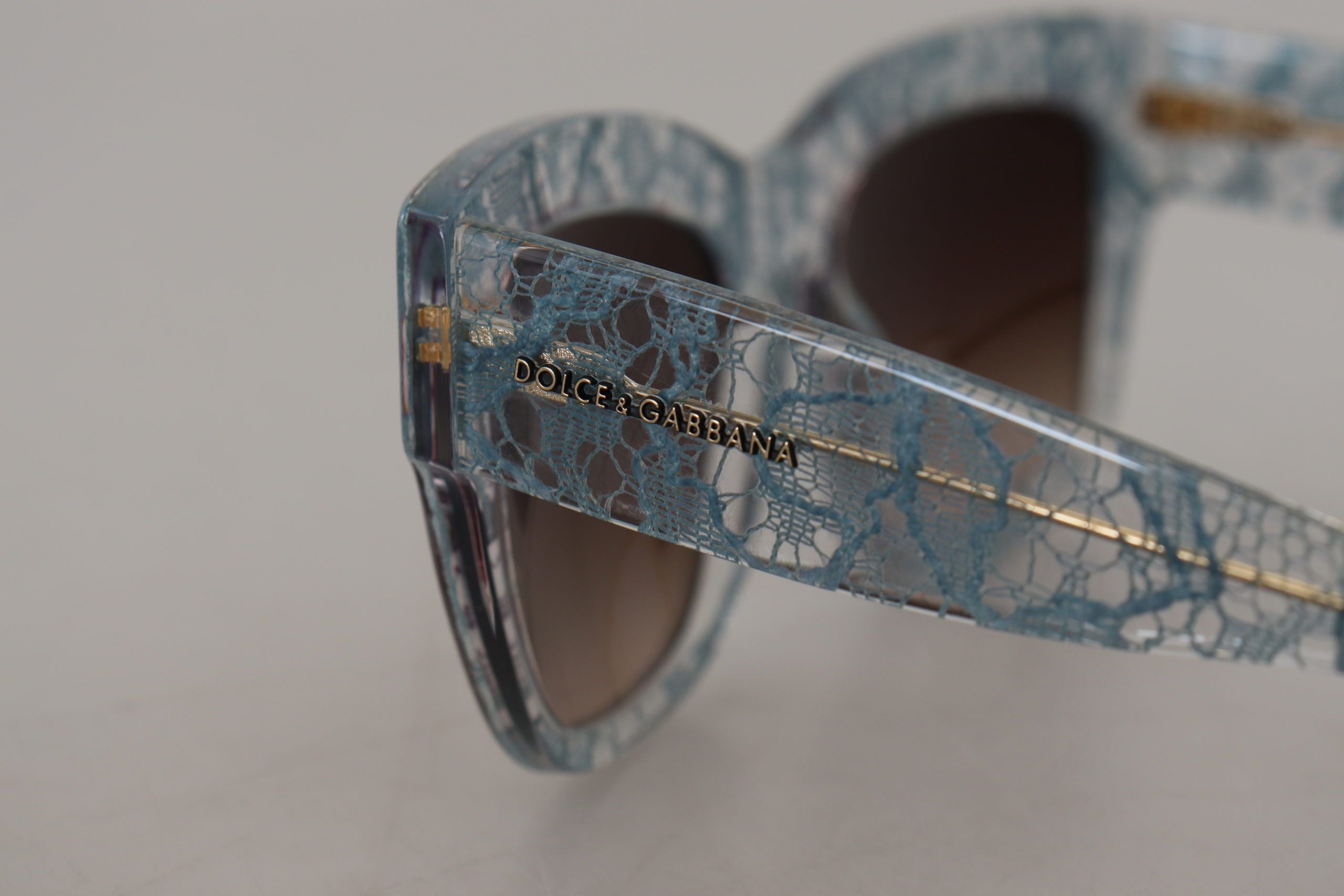 Dolce & Gabbana Elegant Lace Detail Blue Sunglasses - Luksuslaukut ja asusteet Dolce & Gabbana - Tutustu YVES JAVANNI® 