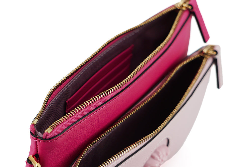 Versace Elegant Pink Leather Pouch Clutch - Luksuslaukut ja asusteet Versace - Tutustu YVES JAVANNI® 