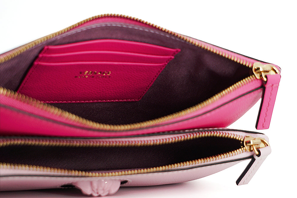 Versace Elegant Pink Leather Pouch Clutch - Luksuslaukut ja asusteet Versace - Tutustu YVES JAVANNI® 