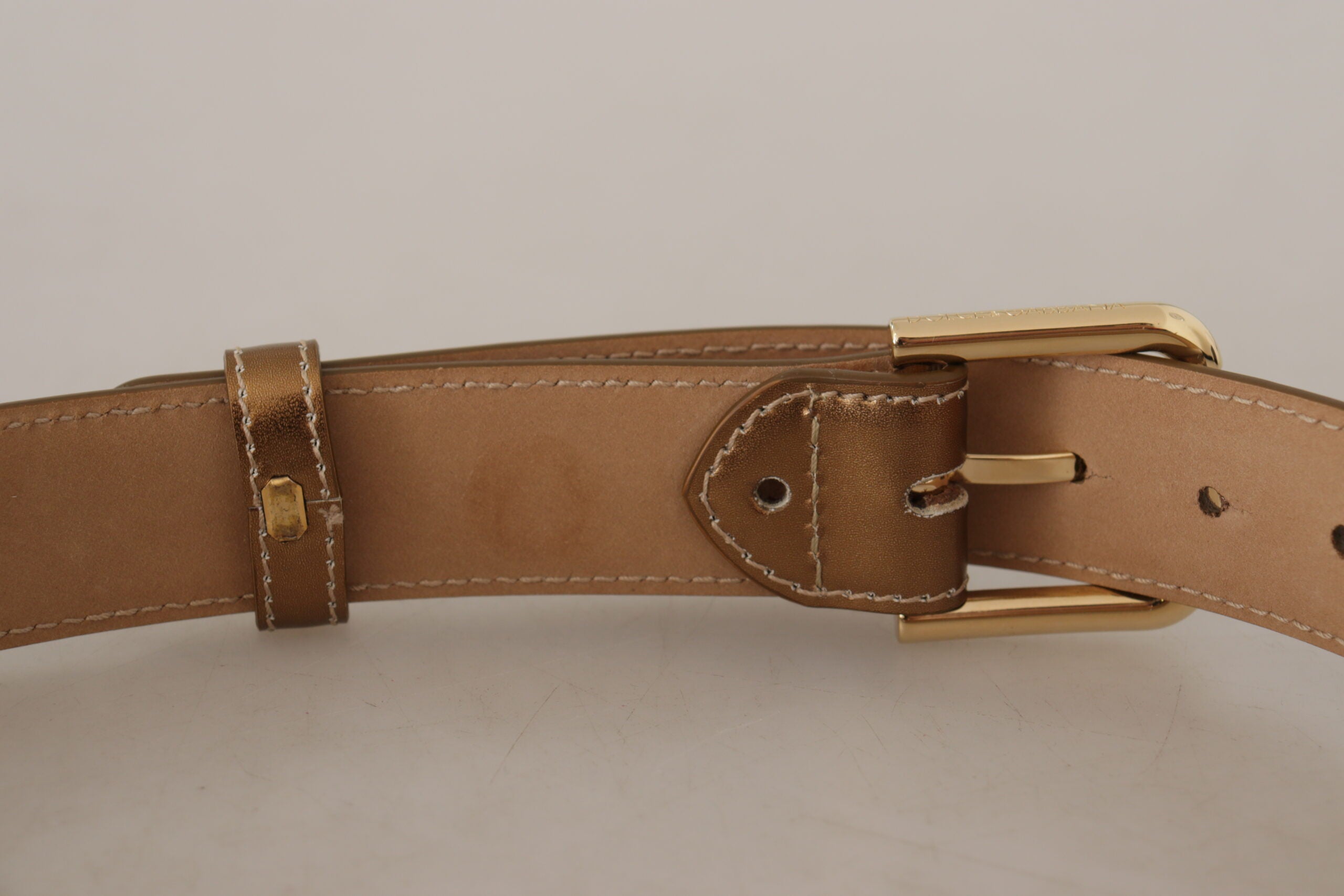 Dolce & Gabbana Elegant Bronze Leather Belt with Logo Buckle - Luksusmuotia Dolce & Gabbana - Tutustu YVES JAVANNI® 