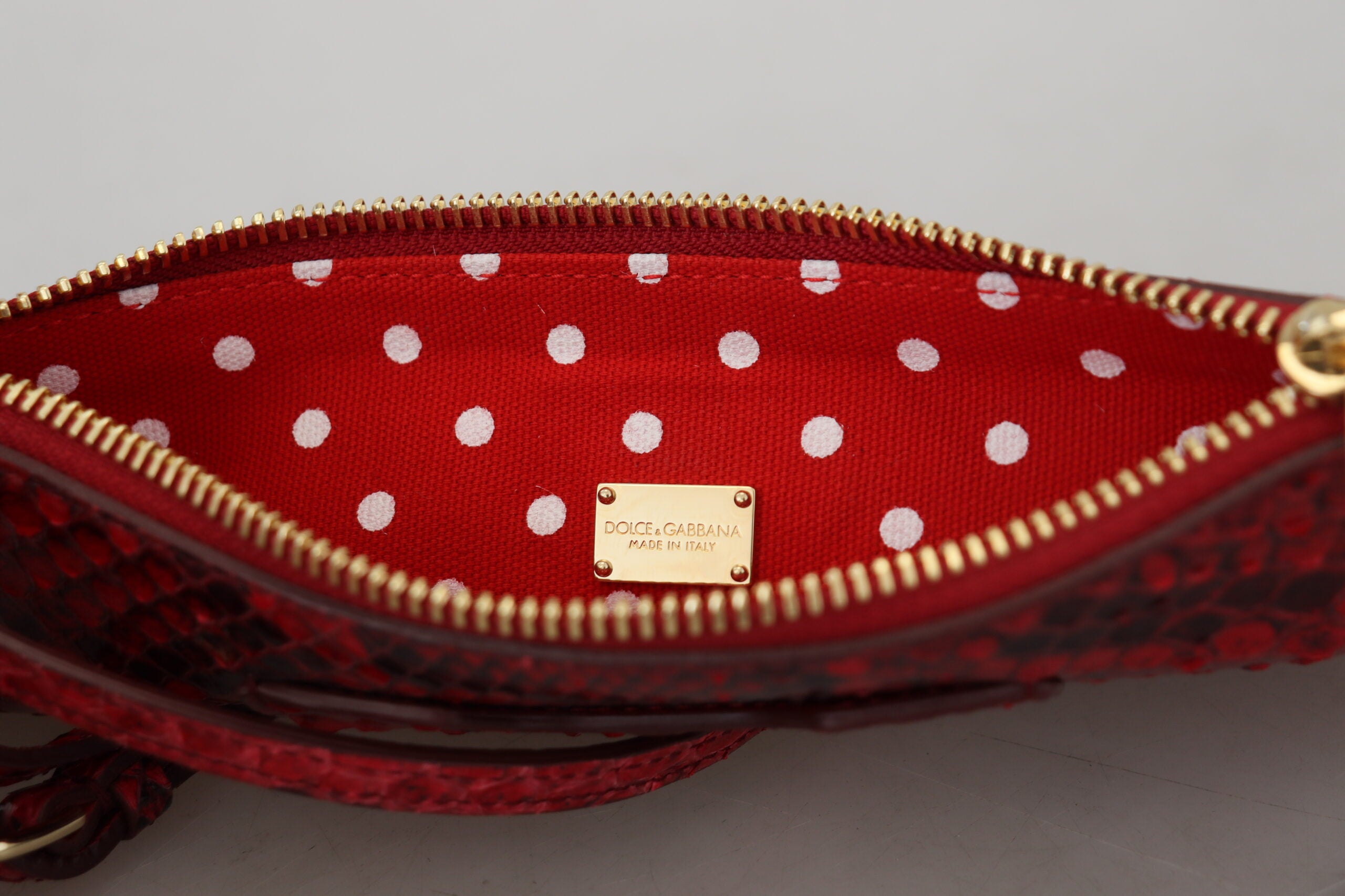 Dolce & Gabbana Elegant Red Leather Ayers Snake Clutch - Luksusmuotia Dolce & Gabbana - Tutustu YVES JAVANNI® 