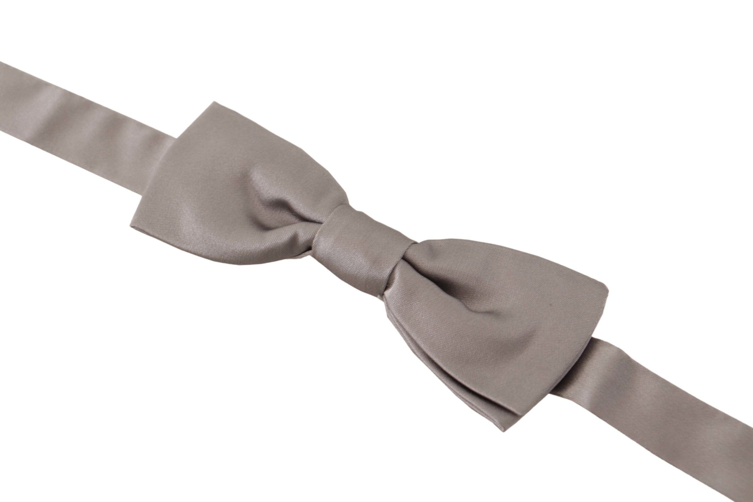 Dolce & Gabbana Elegant Silver Silk Bow Tie for Sophisticated Evening - Luksusmuotia Dolce & Gabbana - Tutustu YVES JAVANNI® 