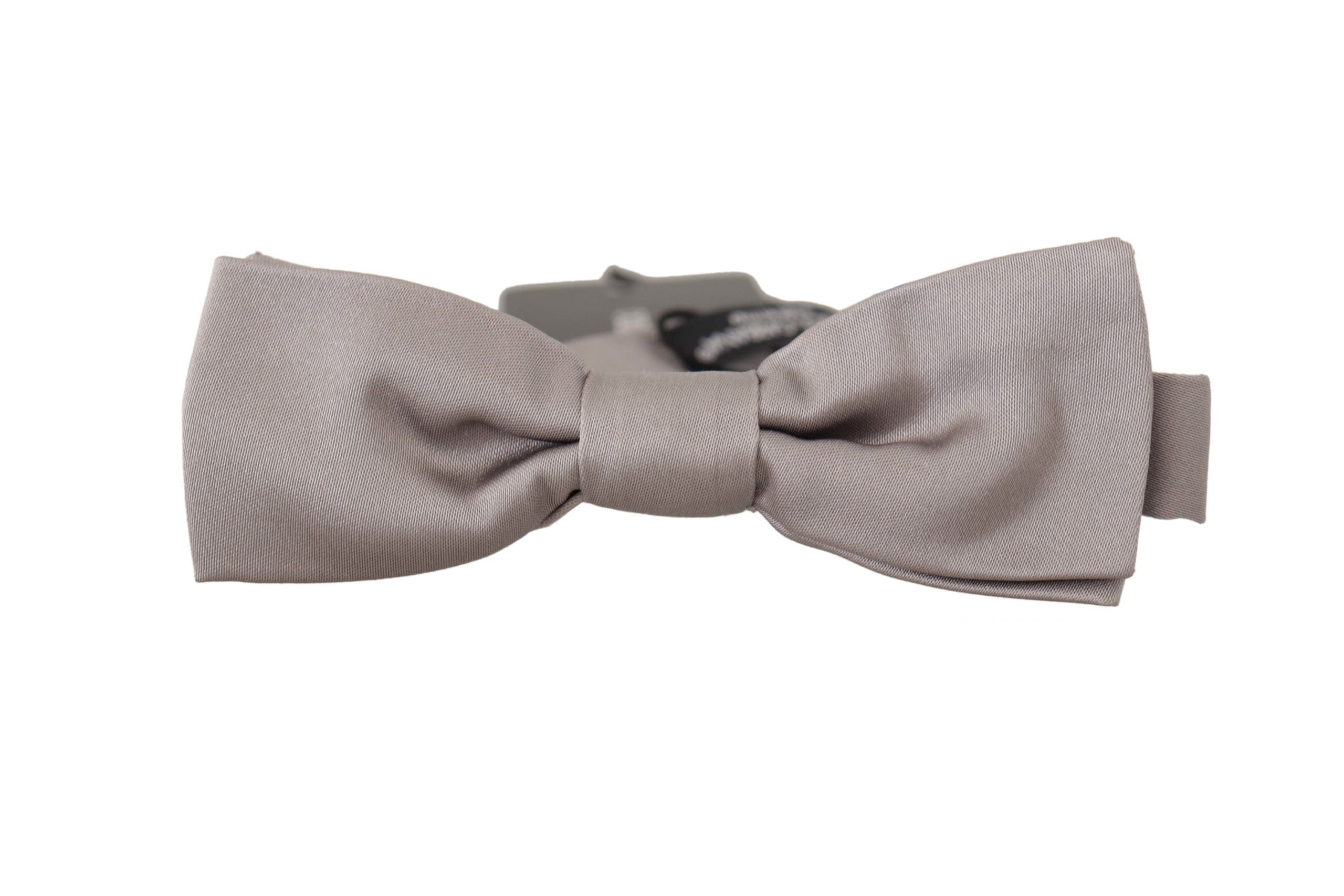 Dolce & Gabbana Elegant Silver Silk Bow Tie for Sophisticated Evening - Luksusmuotia Dolce & Gabbana - Tutustu YVES JAVANNI® 