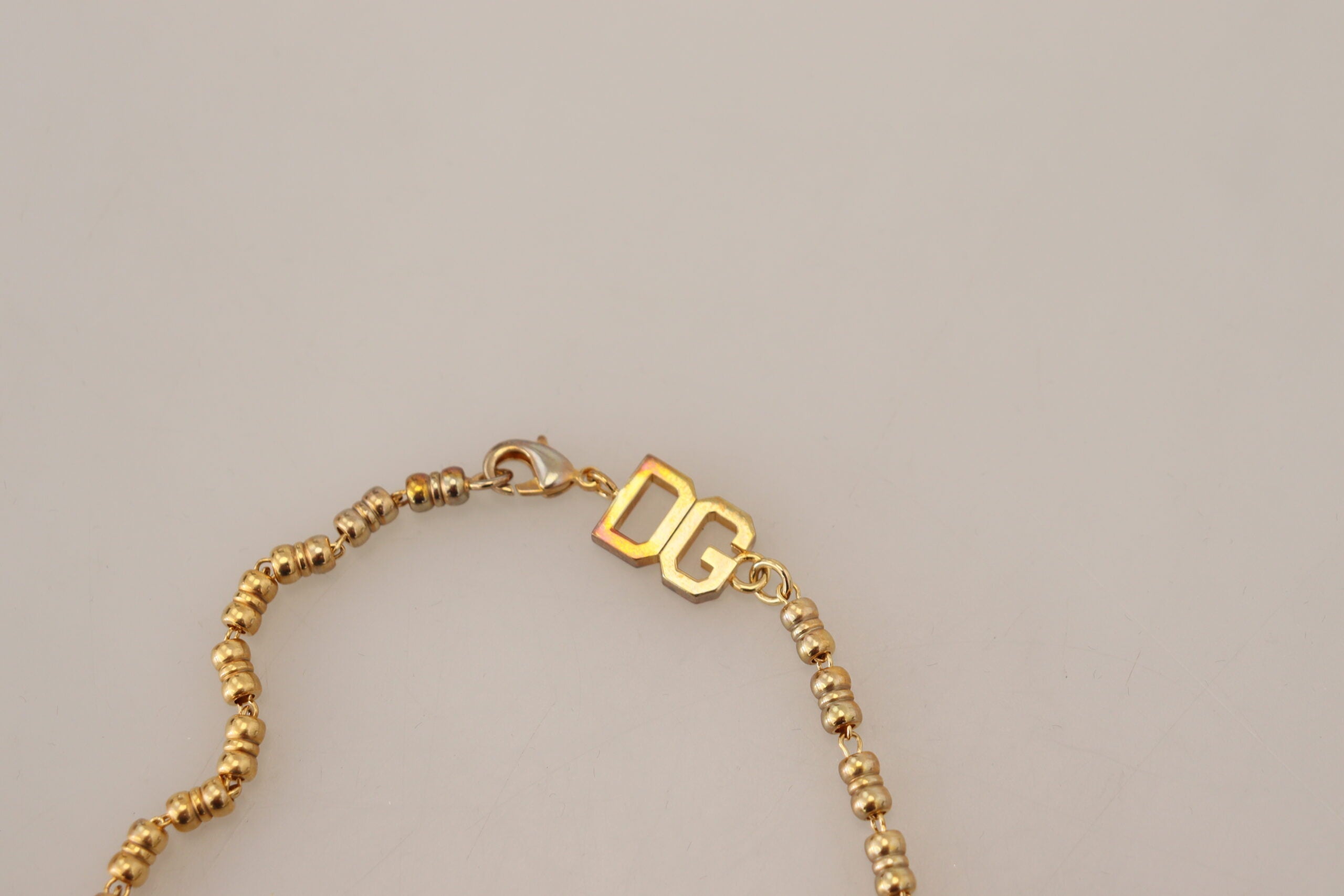 Dolce & Gabbana Elegant Gold Charm Chain Necklace - Luksuslaukut ja asusteet Dolce & Gabbana - Tutustu YVES JAVANNI® 